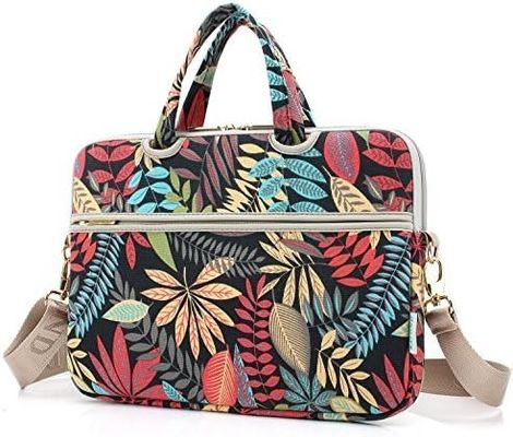 Sac portable conçu pour les ordinateurs portables de 12,5 à 14 pouces avec tissu de toile imprimé intérieur rembourré et plusieurs options de transport