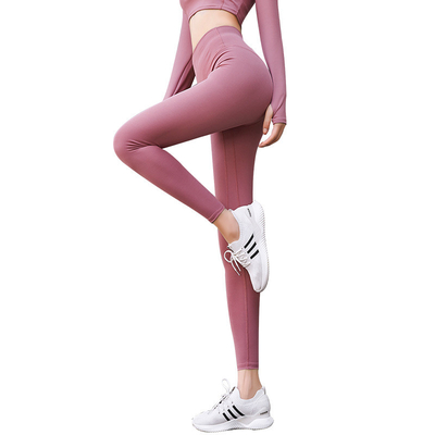 Halète le costume du yoga de pêche des femmes féminines de forme physique la taille que serrée de taille étirent le fonctionnement inférieur