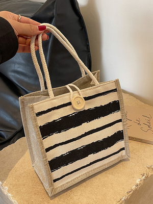 Le sac à main est une boîte de travail.