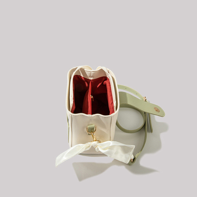 L'été frais tout-match sac de mode féminin tendance de la mode avancée sens de la niche de conception crossbody sac de seau populaire cette année