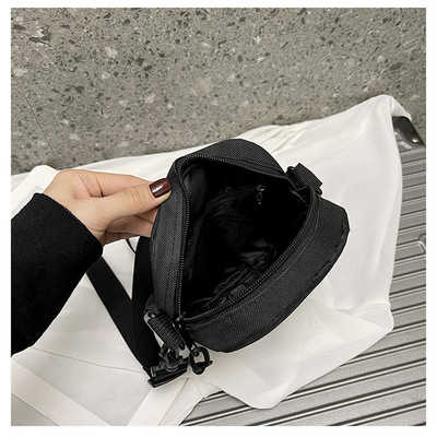 Sac à dos en tissu de sport pour hommes en couleur simple et solide Téléphone portable Sac à dos avec une épaule