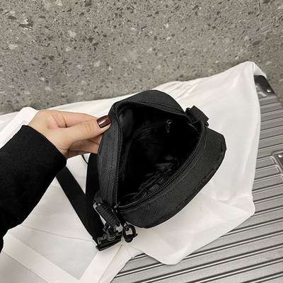 Sac à dos en tissu de sport pour hommes en couleur simple et solide Téléphone portable Sac à dos avec une épaule