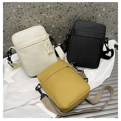 Sac à dos en tissu de sport pour hommes en couleur simple et solide Téléphone portable Sac à dos avec une épaule