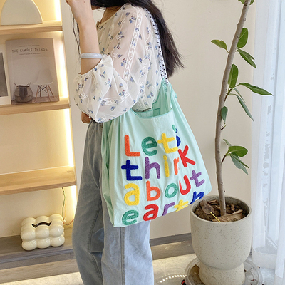 Sac à main de grande capacité de style coréen en tout-en-un sac à épaule de femme portable sac de magasinage à main