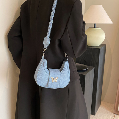 Populaire nouveau sac de niche de conception féminine tendance style étranger sac papillon sens avancée de toutes les épaules sac sous-bracelet