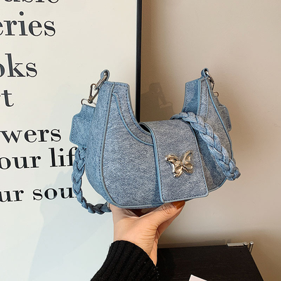 Populaire nouveau sac de niche de conception féminine tendance style étranger sac papillon sens avancée de toutes les épaules sac sous-bracelet