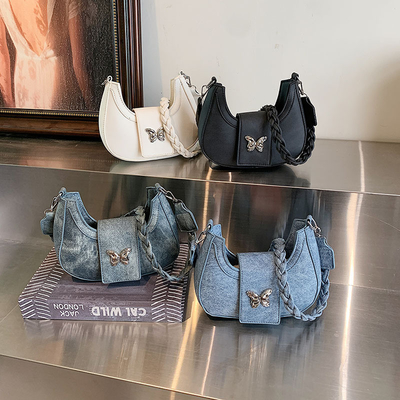 Populaire nouveau sac de niche de conception féminine tendance style étranger sac papillon sens avancée de toutes les épaules sac sous-bracelet