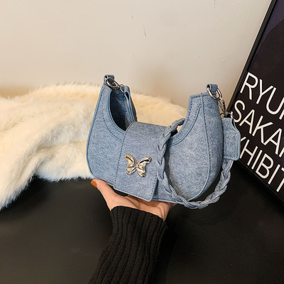 Populaire nouveau sac de niche de conception féminine tendance style étranger sac papillon sens avancée de toutes les épaules sac sous-bracelet