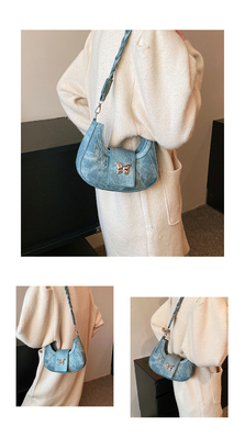 Populaire nouveau sac de niche de conception féminine tendance style étranger sac papillon sens avancée de toutes les épaules sac sous-bracelet
