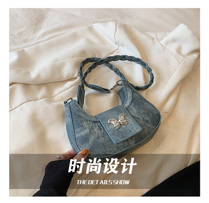 Populaire nouveau sac de niche de conception féminine tendance style étranger sac papillon sens avancée de toutes les épaules sac sous-bracelet