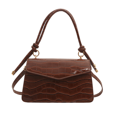 La qualité du cuir est pure. Tout en un sac à main pour femme.