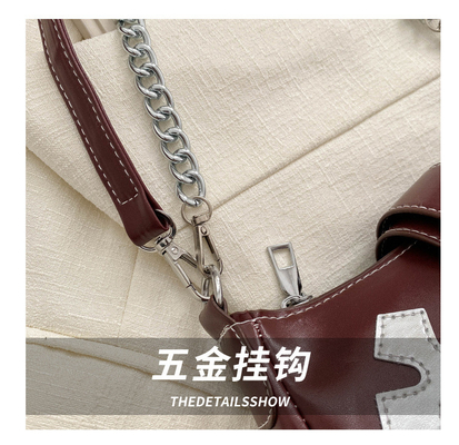 Un sac à main de haute qualité mode automne et hiver pour femmes mode de niche mode tout rétro chaîne de voyageur épaule et épaule