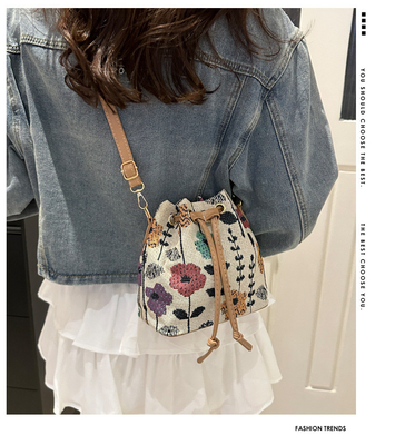 NEW CHINESE NATIONAL VENT AUSSILLE BUCKET BAG MODE SIMPLE tendance de l'été nouveau style de lin de haute qualité sens unique épaule