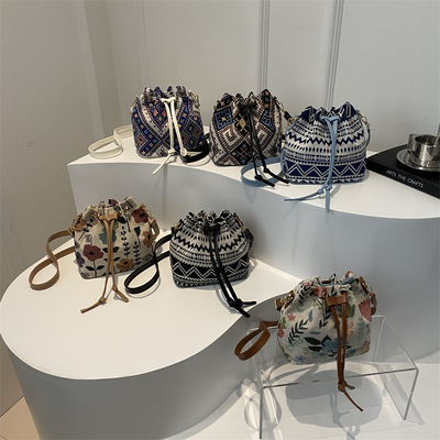 NEW CHINESE NATIONAL VENT AUSSILLE BUCKET BAG MODE SIMPLE tendance de l'été nouveau style de lin de haute qualité sens unique épaule