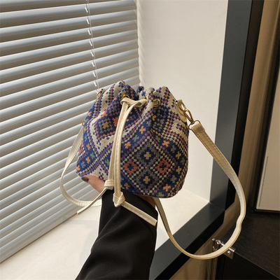 NEW CHINESE NATIONAL VENT AUSSILLE BUCKET BAG MODE SIMPLE tendance de l'été nouveau style de lin de haute qualité sens unique épaule