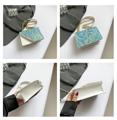 Sac de la nouvelle mode de la femme petit sac carré en gros de niche simple rétro sable rapide tout seul épaule crossbody cha
