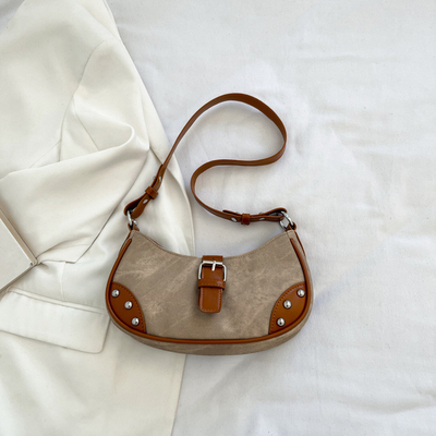La mode française Casual sous-bracelet sac femme 2024 nouvelle texture sac à main de baguette de couleur simple patchwork sac à main