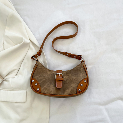 La mode française Casual sous-bracelet sac femme 2024 nouvelle texture sac à main de baguette de couleur simple patchwork sac à main