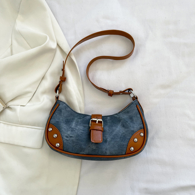 La mode française Casual sous-bracelet sac femme 2024 nouvelle texture sac à main de baguette de couleur simple patchwork sac à main