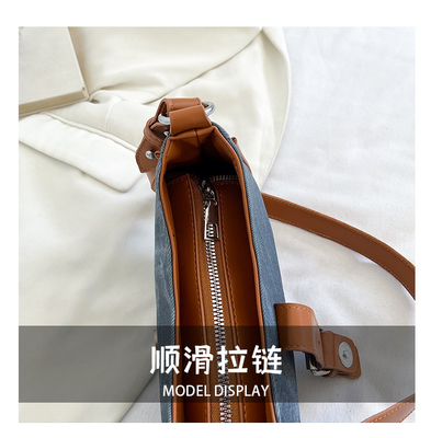 La mode française Casual sous-bracelet sac femme 2024 nouvelle texture sac à main de baguette de couleur simple patchwork sac à main