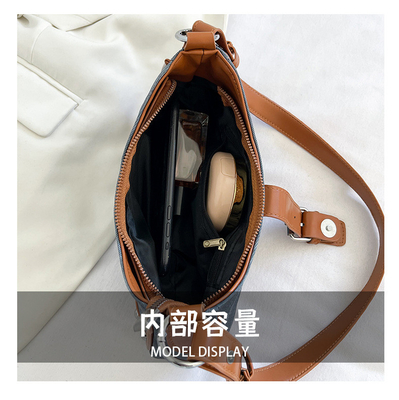 La mode française Casual sous-bracelet sac femme 2024 nouvelle texture sac à main de baguette de couleur simple patchwork sac à main