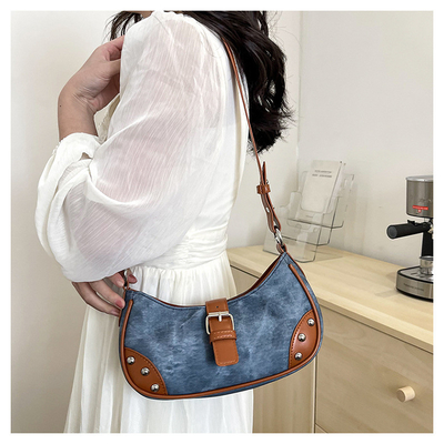 La mode française Casual sous-bracelet sac femme 2024 nouvelle texture sac à main de baguette de couleur simple patchwork sac à main