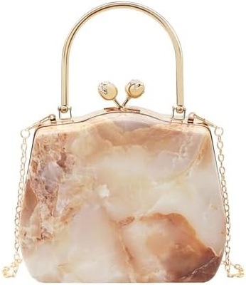Le sac à main, le sac à main géométrique, le sac à main pour les fêtes, les mariages, les balles de fin d'année