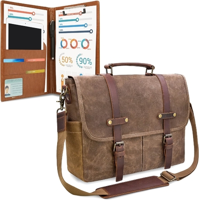 Le sac de messager est imperméable à l'eau, vintage, en cuir authentique, en toile de cire.