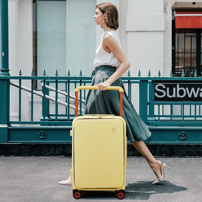 La poignée de bagages est large, le design de luxe, la valise roulante, la pochette de voyage, la pochette de voyage, la pochette de voyage.