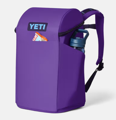 Sac à dos étanche avec système élastique avant stylé, deux poches pour bouteilles d'eau et poignées de transport équilibrées sur le dessus